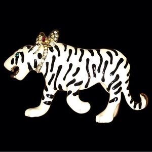 White tiger with black stripe with bow brooch